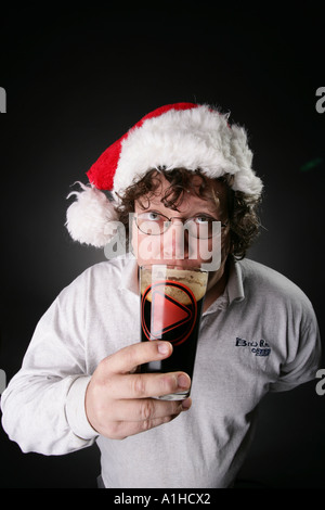 Jeff Browning, the brewmaster at BAR in New Haven Connecticut drinking one of his creations Stock Photo