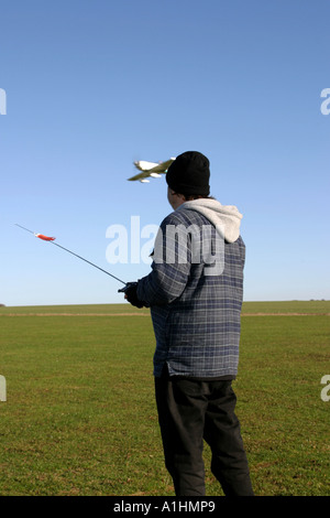 Man flying a radio controlled model aircraft Stock Photo
