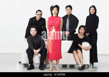 Portrait of three young men and three young women looking serious Stock Photo