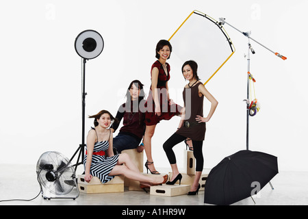 Portrait of four young women smiling Stock Photo