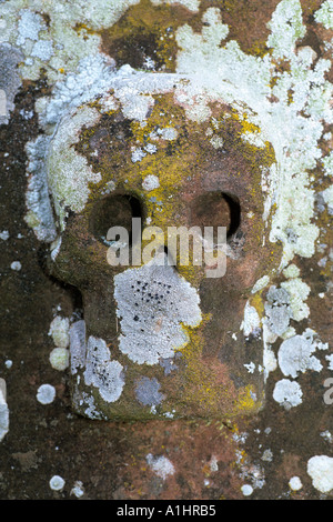 Plague marker on lichen encrusted grave stone in Melrose Abbey graveyard Stock Photo