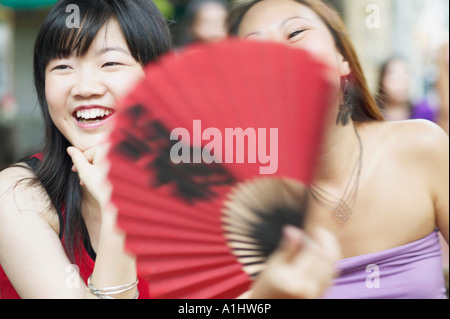 Close-up of two young women smiling Stock Photo