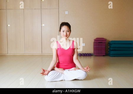 Portrait of a teenage girl meditating Stock Photo