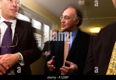 CONSERVATIVE PARTY LEADER MICHAEL HOWARD ON THE WELSH LEG OF HIS NATIONWIDE TOUR MICHAEL HOWARD WITH STAFF AT COLEGSIRGAR CA Stock Photo