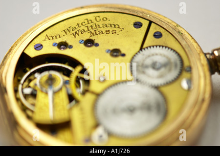 Close up of the clockwork mechanism of an old pocket watch Stock Photo