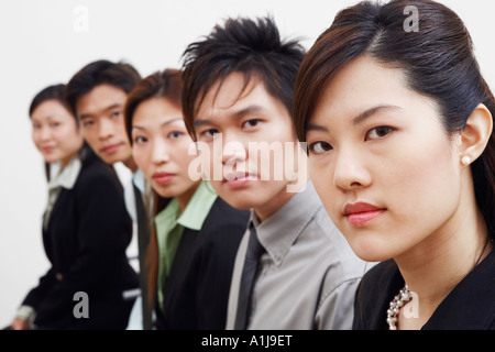 Portrait of three businesswomen with two businessmen Stock Photo