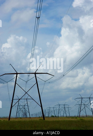 Towers power lines against a cloudy sky background. Electricity ...