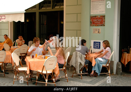 Customers dine outside at a restaurant in the old Town Stare Mesto Prague Czech Stock Photo