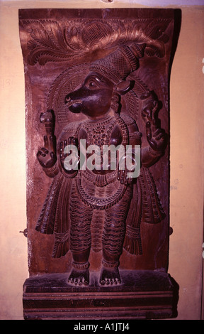 Ancient Hanuman deity carved on sandalwood India Stock Photo