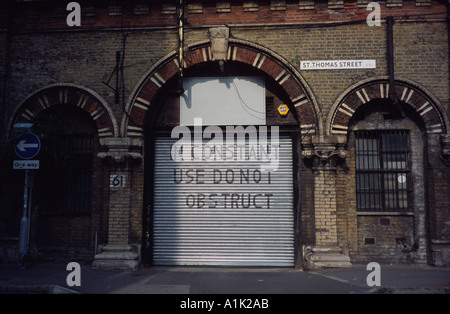 Door in constant use do not obstruct St Thomas Street Southwark London, England UK Stock Photo