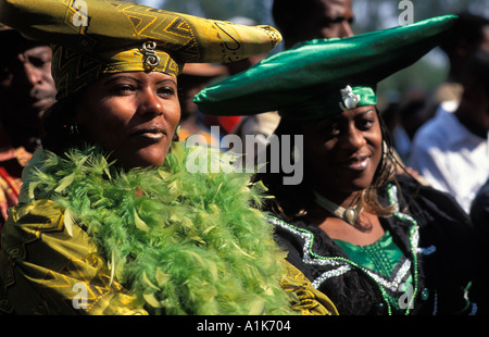 Herero women wearing traditional dress in procession for the Ma Herero Day Parade August Okahandja Namibia Stock Photo