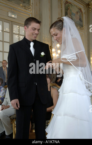 Exchanging rings bride and groom wedding ceremony Rennes France Stock Photo