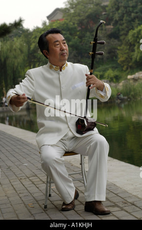 Beijing residents play Chinese folk musical instrument 2006 Stock Photo