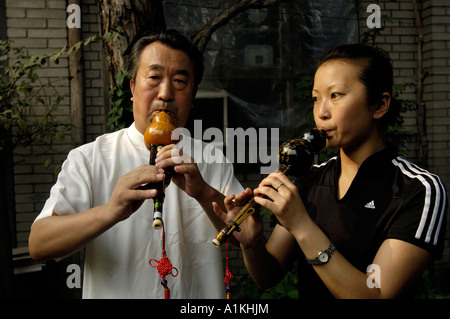 Beijing residents play Chinese folk musical instrument 2006 Stock Photo