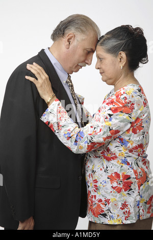 Loving Indian senior citizen couple husband wife head to head Stock Photo