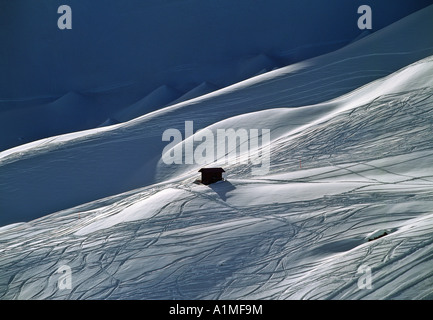 tracks of skiers in powdersnow skier area of parsenn near resort of davos swiss alpes canton of grisons switzerland Stock Photo