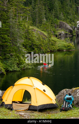A backpacker enjoying a pack raft while camping on Culross Island ...