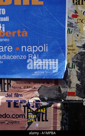Posters on a wall in Naples Italy Stock Photo