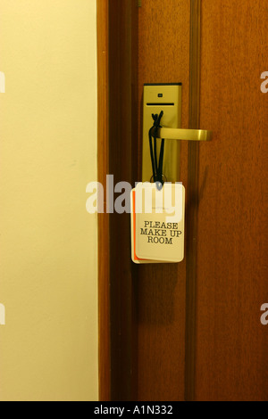 Do not disturb sign hanging from a hotel room door handle Stock Photo ...