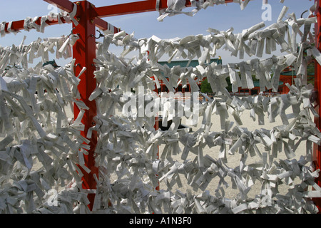 Bad luck messages omikuji tied up Heian jingu shrine to blow away the bad luck Japan Asia Stock Photo