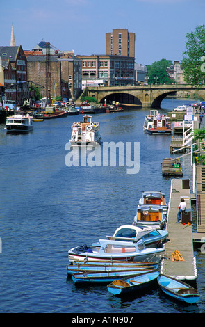 Boats and pleasure cruisers on the River Ouse York North Yorkshire England Stock Photo