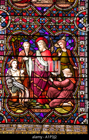a stained glass window in Lincoln cathedral, depicting Jesus and followers, Lincolnshire, UK Stock Photo