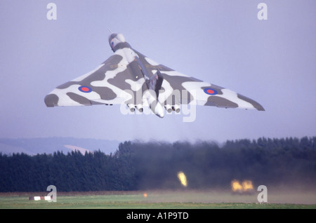 Plane taking off from airshow runway a preserved Vulcan bomber taking off from airfieldin Kent England UK Stock Photo