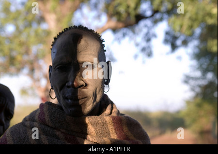 Man standing partially in the shade in Geia village in southern Ethiopia Stock Photo