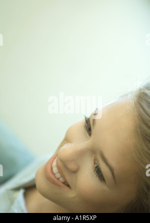 Young woman smiling, close-up of face Stock Photo