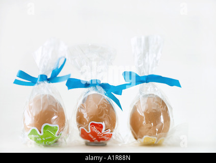 Chocolate eggs in plastic wrappers Stock Photo