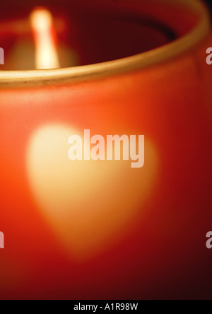 Candleholder with heart pattern, extreme close-up Stock Photo