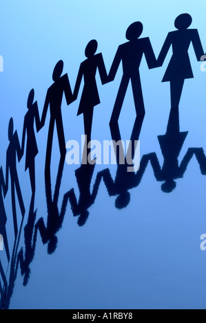 Team of paper chain people in a row holding hands. Copy space Stock ...