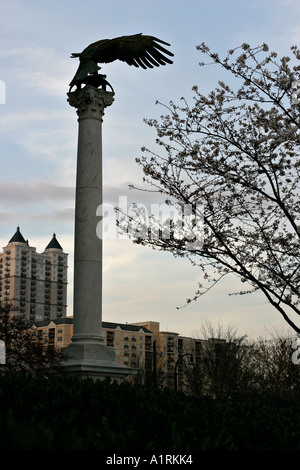 The Eagle Plinth: A bronze sculpture of an eagle landing on a tall plinth Stock Photo