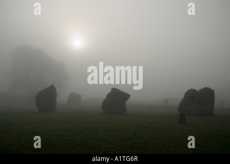 Avebury stone circle in the morning mist on the day of the Winter Solstice Stock Photo