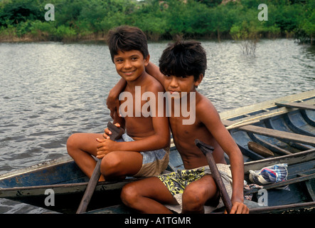 2, two, Brazilian boys, boys, friends, fishing, dugout canoe, Obim Lake, Amazon River Basin, Amazonas State, Brazil, South America Stock Photo