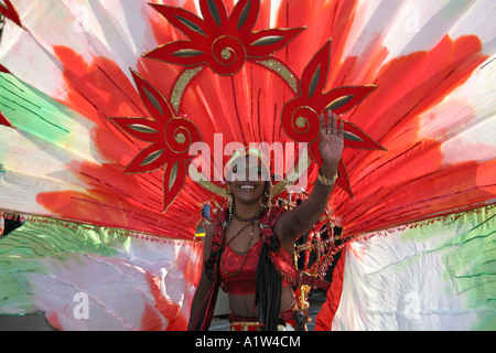 Young girl dressed in traditional Caribbean carnival costume outside the houses of parliament during the New Years Day Parade 20 Stock Photo