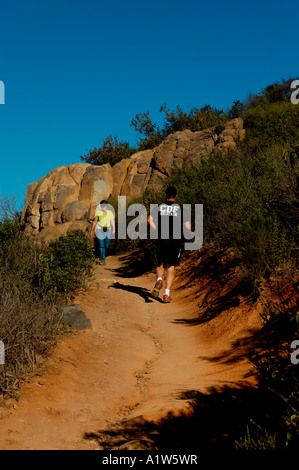Hikers on trail in southern California Stock Photo