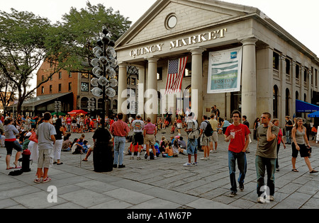Crowd watching a street performer at Quincy Market in the Faneuil Hall Marketplace Boston Massachusetts USA Stock Photo
