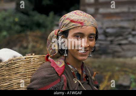 INDIA HIMACHEL PRADESH  MALANA VILLAGE 1999. Young  woman with basket on her back,in village whose economy is based  on hashish. Stock Photo
