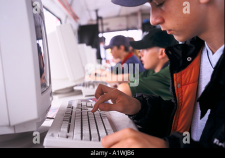 Young people USING SCHOOL COMPUTERS BRISTOL Stock Photo