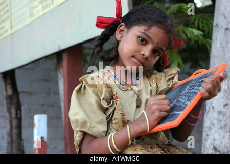 An indian girl in Srirangam Sri Ranganathaswamy temple near Trichy in Tamil Nadu India Stock Photo