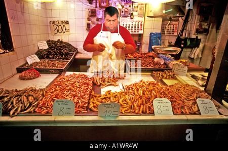 Fishmonger in the Central Market Mercado Central in Malaga Spain Andalusia Europe EU Stock Photo