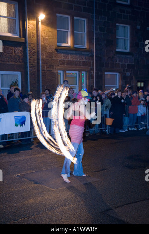 Stonehaven Fireball fire Ceremony, Stonehaven High Street.  Hogmanay, New Year festival, fiery party & festival on the Scottish coast, Scotland, UK Stock Photo