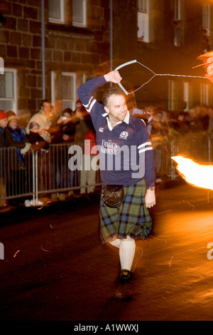 Stonehaven Fireball fire Ceremony, Stonehaven High Street.  Hogmanay, New Year festival, fiery party & festival on the Scottish coast, Scotland, UK Stock Photo