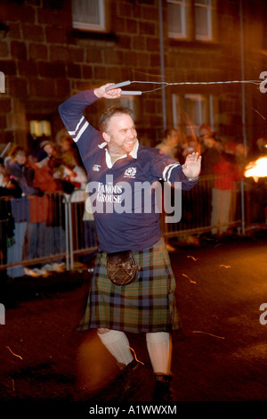 Stonehaven Fireball fire Ceremony, Stonehaven High Street.  Hogmanay, New Year festival, fiery party & festival on the Scottish coast, Scotland, UK Stock Photo