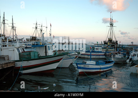 Fishing boats in harbour at Houmt Souq on Jerba Island in Tunisia Stock Photo