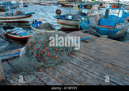 Fishing boats in harbour at Houmt Souq on Jerba Island in Tunisia Stock Photo