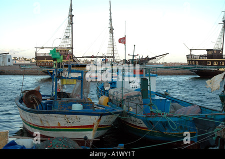 Fishing boats in harbour at Houmt Souq on Jerba Island in Tunisia Stock Photo