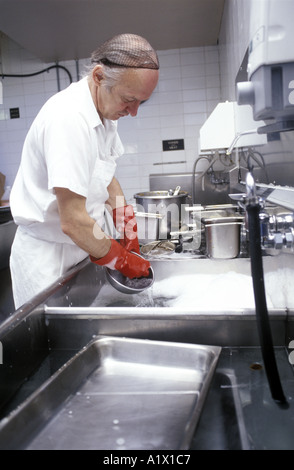 Pot washer Working In A Commercial Kitchen Stock Photo Alamy