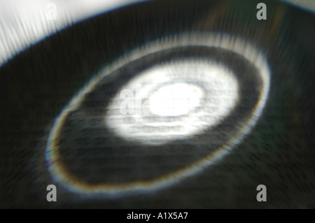 Shadow of a CD on Binary Code Stock Photo